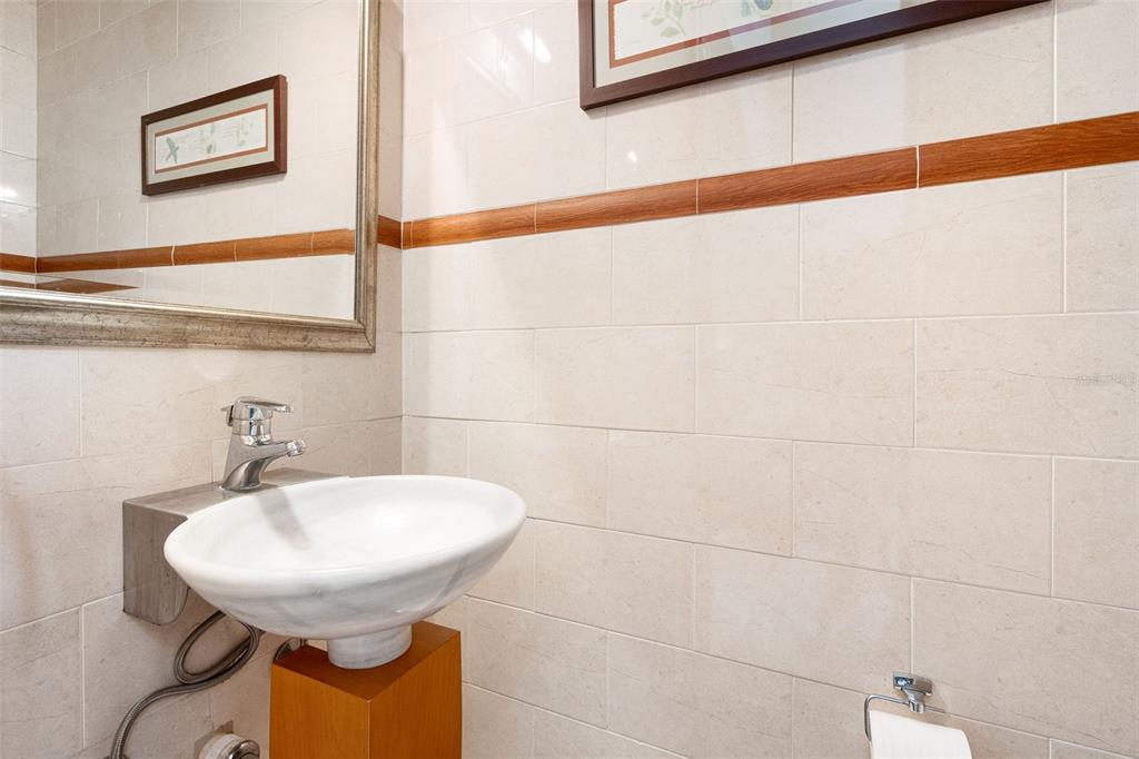 1 Palma Real Avenue, Unit 2 A6 Guaynabo, PR 00969 - Photo 21 of 49 a bathroom with a sink and a mirror