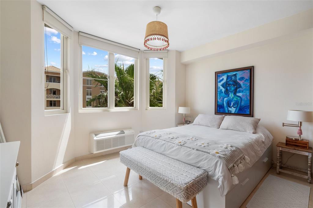 1 Palma Real Avenue, Unit 2 A6 Guaynabo, PR 00969 - Photo 25 of 49 a bedroom with a bed and a large window