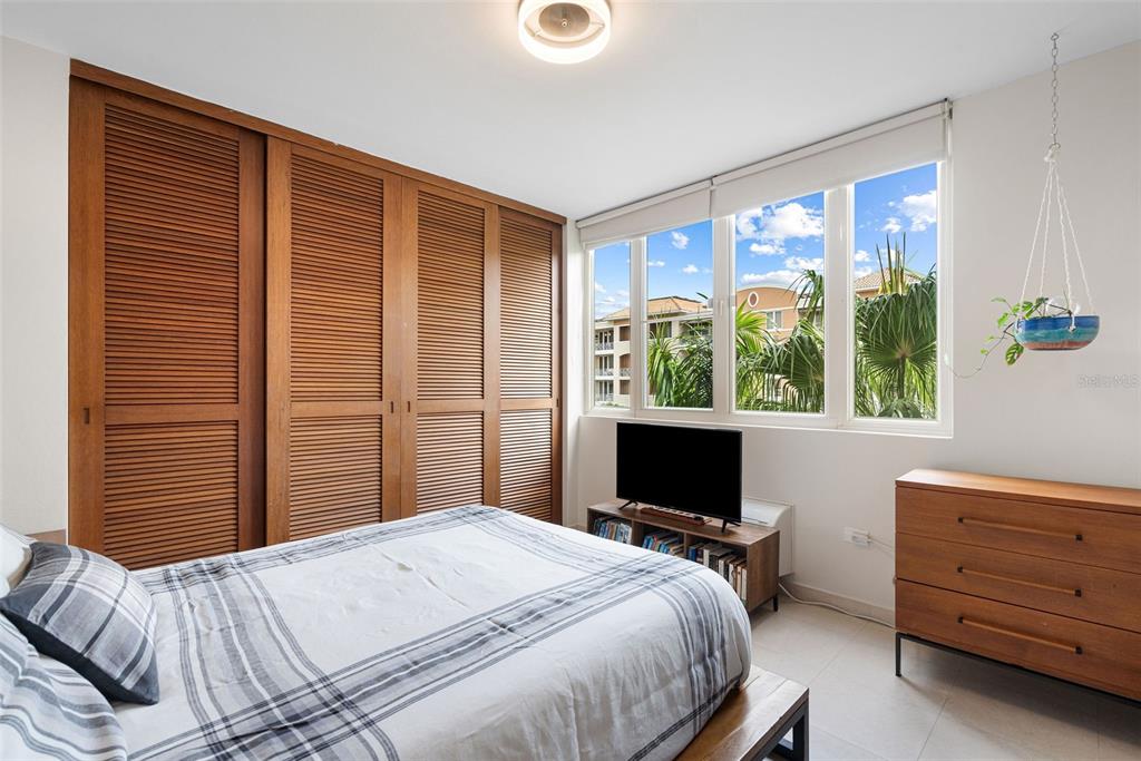 1 Palma Real Avenue, Unit 2 A6 Guaynabo, PR 00969 - Photo 26 of 49 a bedroom with a bed and a television