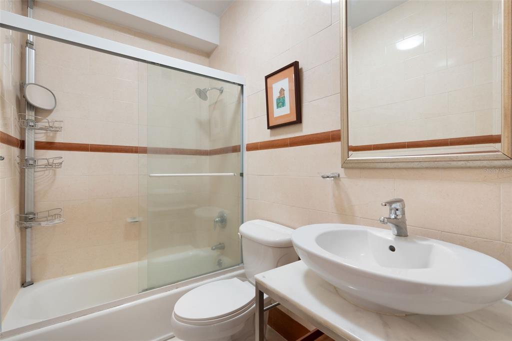 1 Palma Real Avenue, Unit 2 A6 Guaynabo, PR 00969 - Photo 27 of 49 a bathroom with a sink toilet and shower