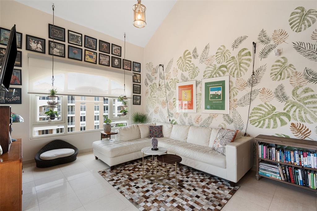 1 Palma Real Avenue, Unit 2 A6 Guaynabo, PR 00969 - Photo 43 of 49 a living room with furniture and a rug