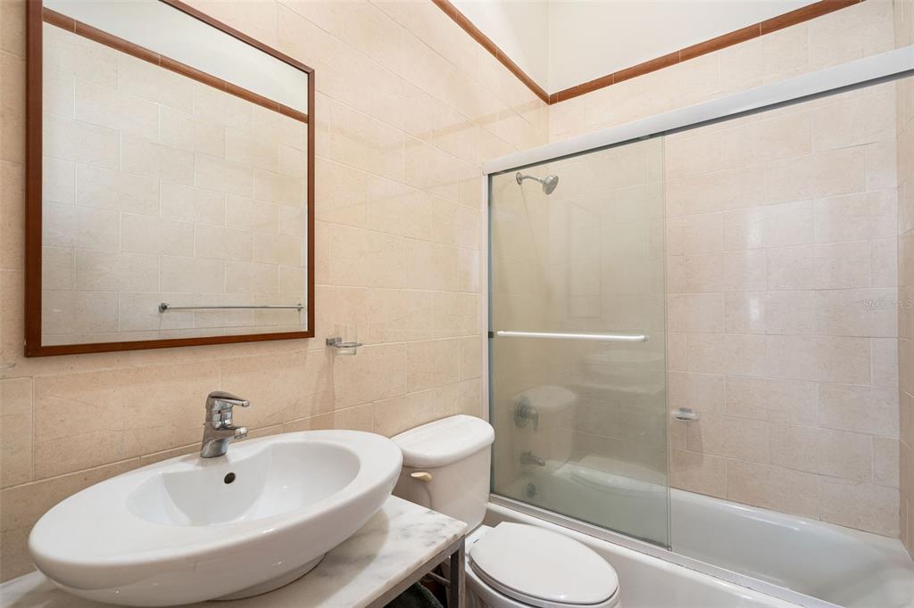 1 Palma Real Avenue, Unit 2 A6 Guaynabo, PR 00969 - Photo 45 of 49 a bathroom with a sink a toilet and shower
