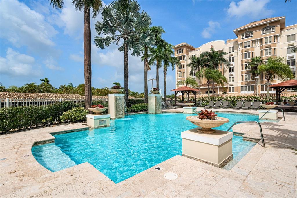 1 Palma Real Avenue, Unit 2 A6 Guaynabo, PR 00969 - Photo 47 of 49 a view of a swimming pool with a patio and a garden