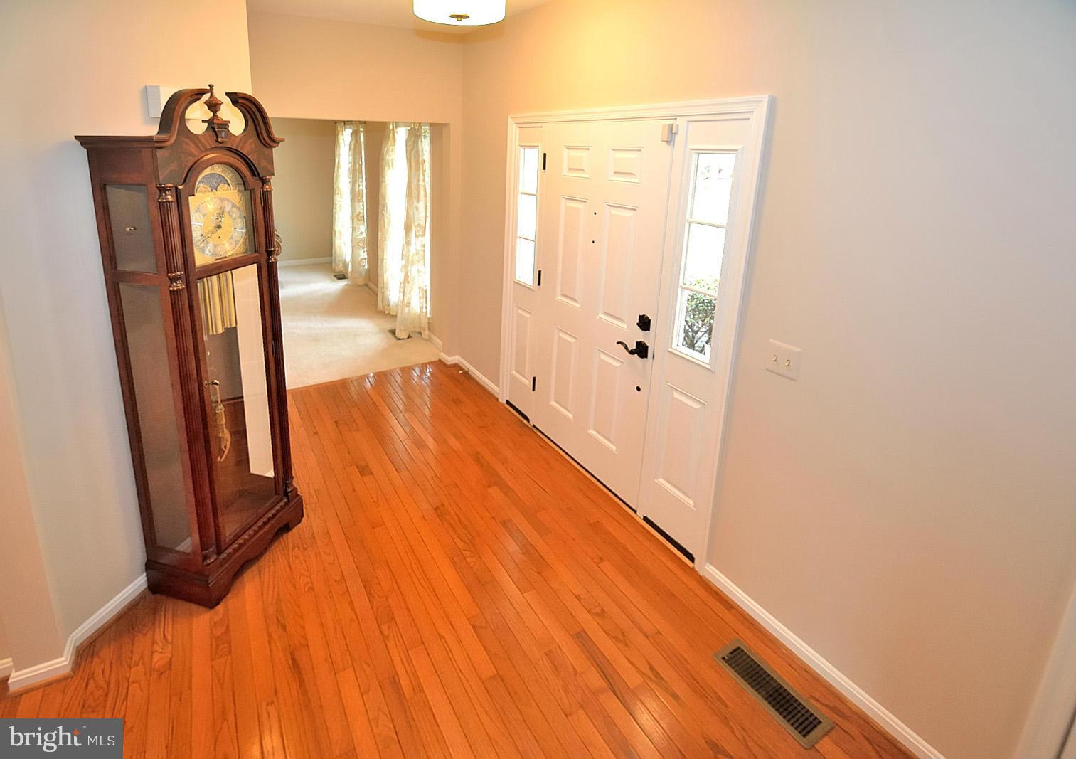 2303 Hurlingham Lane Reston, VA 20191 - Photo 2 of 30 a view of empty room with floor to ceiling window