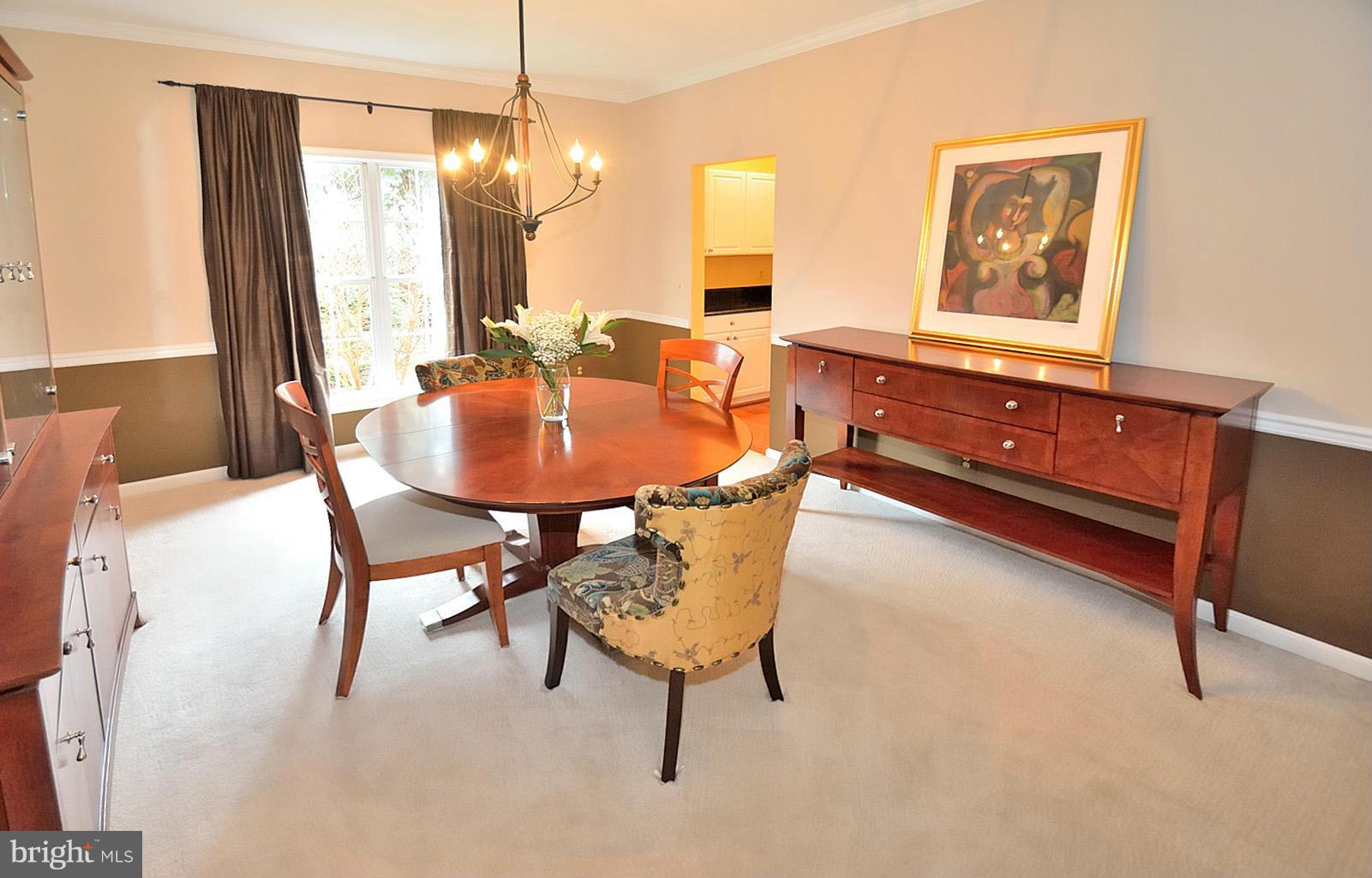 2303 Hurlingham Lane Reston, VA 20191 - Photo 11 of 30 a dining room with furniture and window