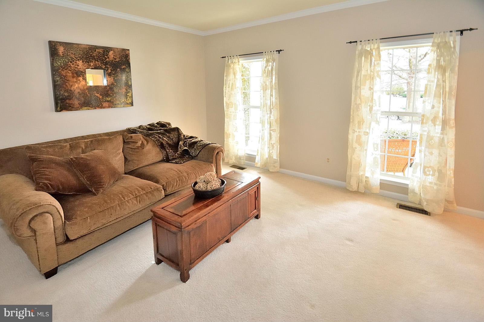 2303 Hurlingham Lane Reston, VA 20191 - Photo 13 of 30 a living room with furniture and a window