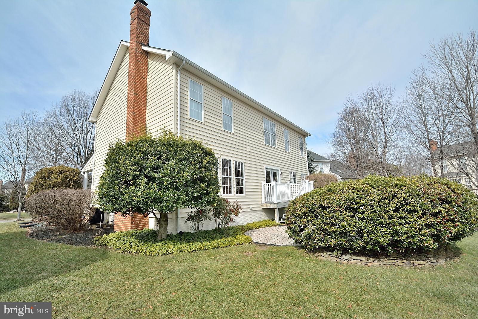 2303 Hurlingham Lane Reston, VA 20191 - Photo 30 of 30 a front view of a house with a yard