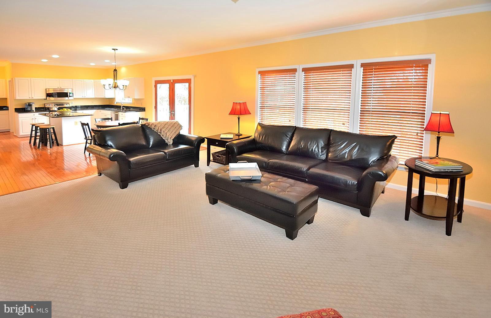 2303 Hurlingham Lane Reston, VA 20191 - Photo 9 of 30 a living room with furniture and a large window