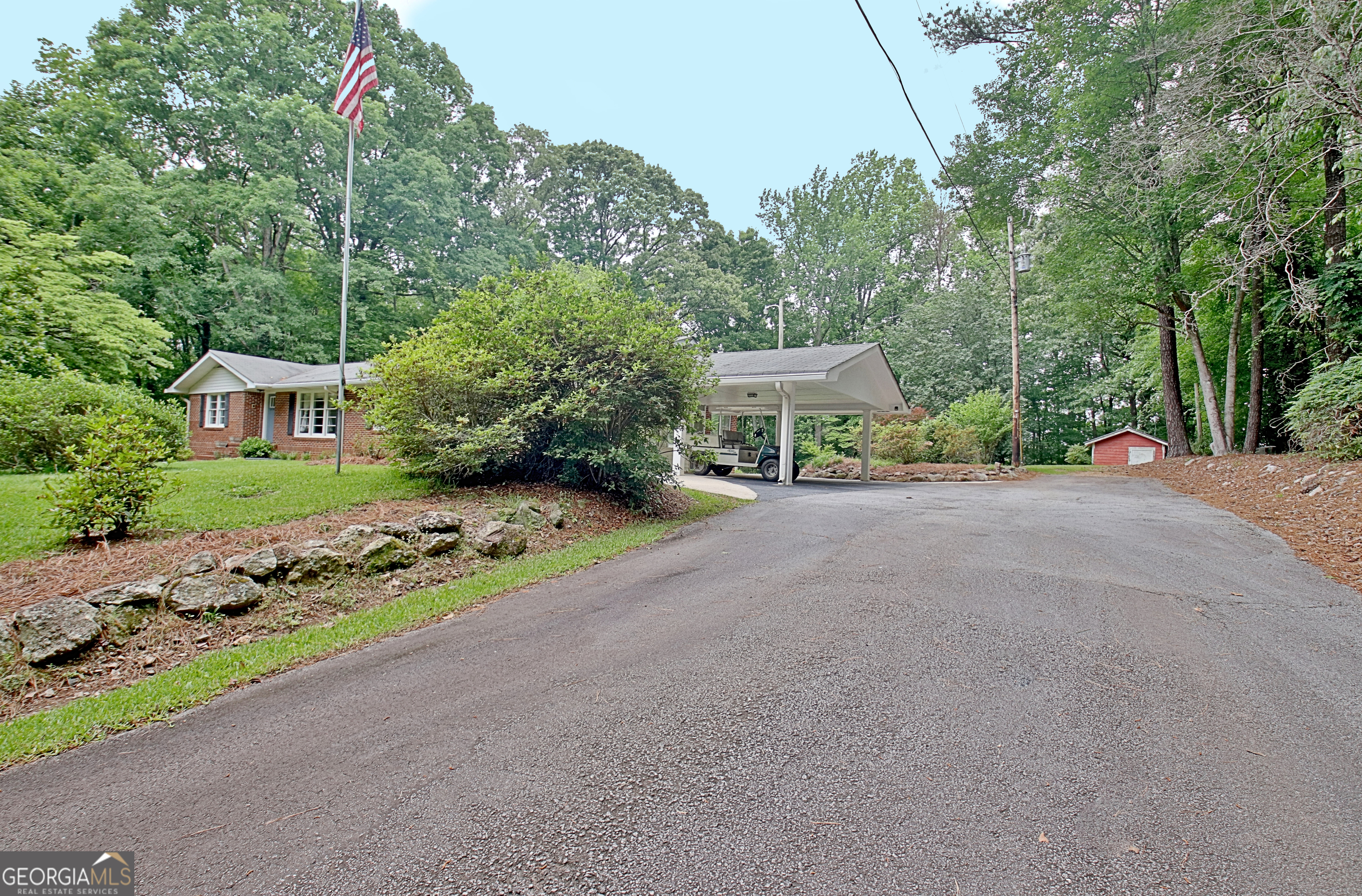 717 Tyrone Road Tyrone, GA 30290 - Photo 4 of 58 a view of a house with a yard and potted plants