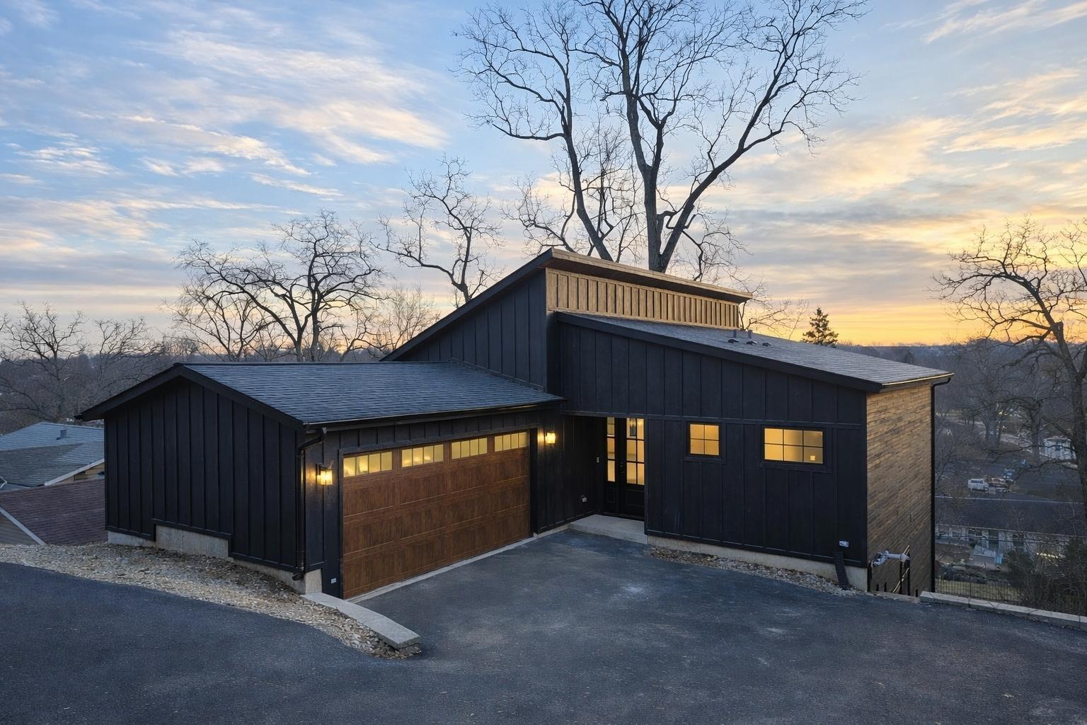 a view of a house with large windows