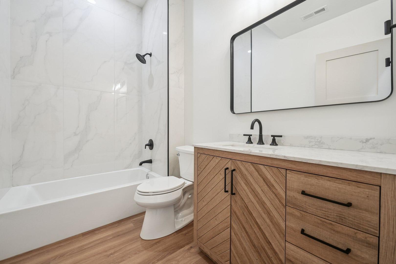 298 Apache Trail Lake In The Hills, IL 60156 - Photo 13 of 23 a bathroom with a sink a toilet and shower