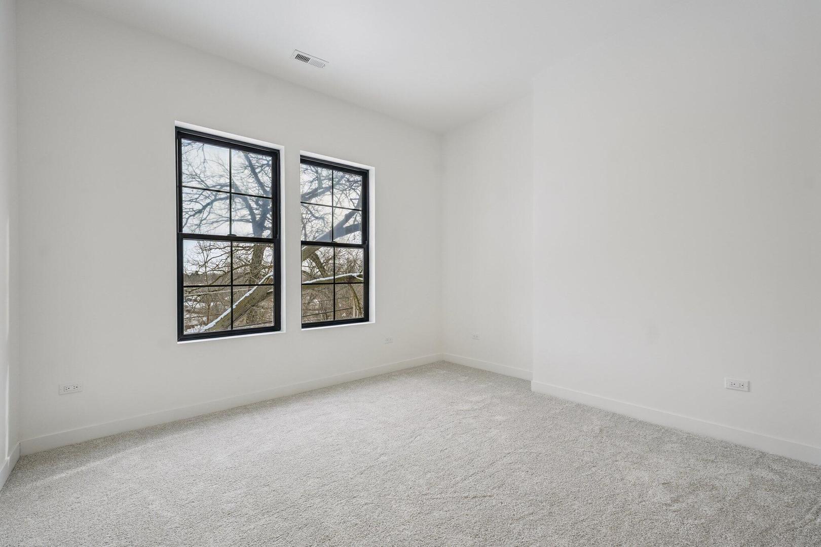 298 Apache Trail Lake In The Hills, IL 60156 - Photo 21 of 23 an empty room with a window