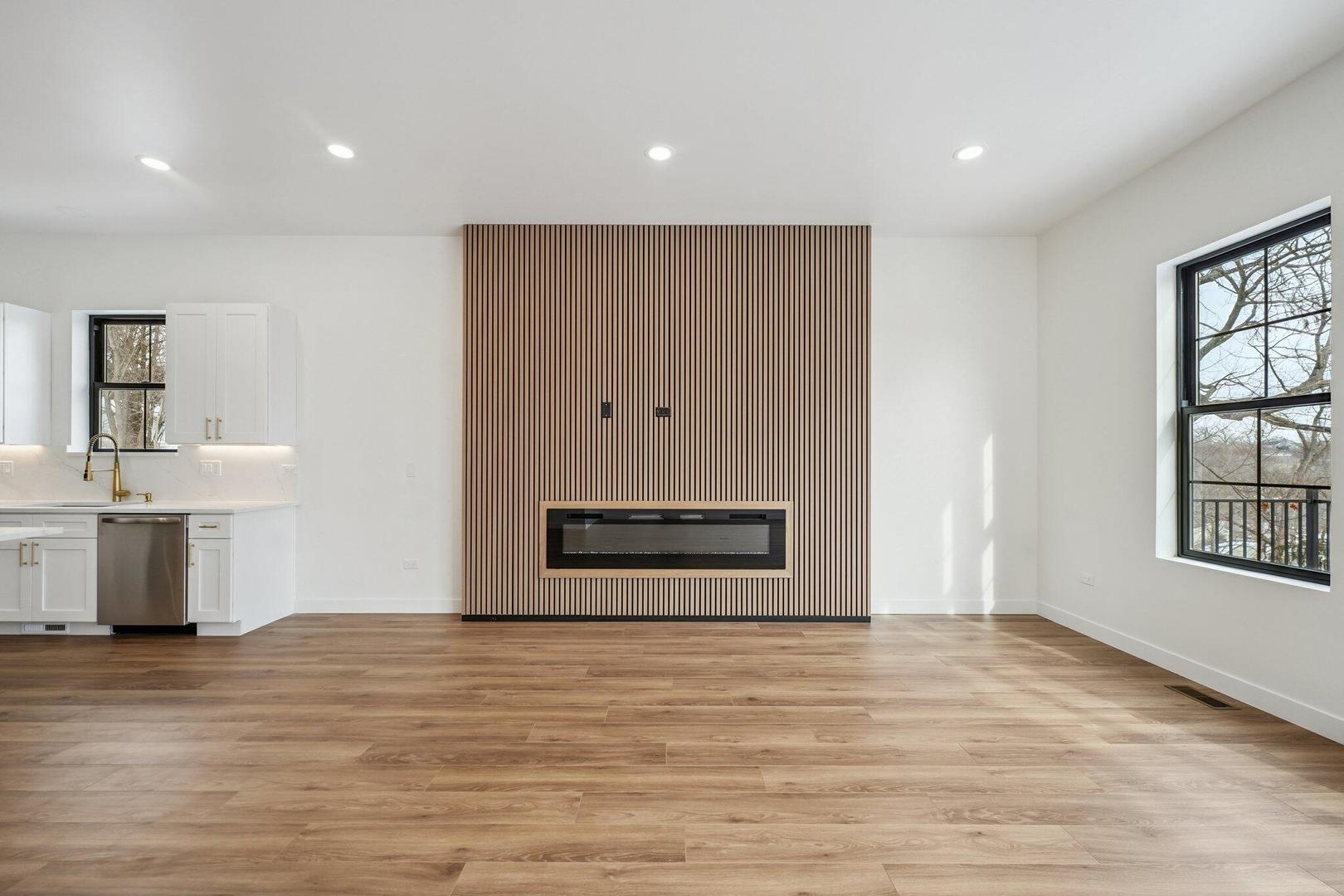 298 Apache Trail Lake In The Hills, IL 60156 - Photo 5 of 23 a view of a kitchen with an empty room and window