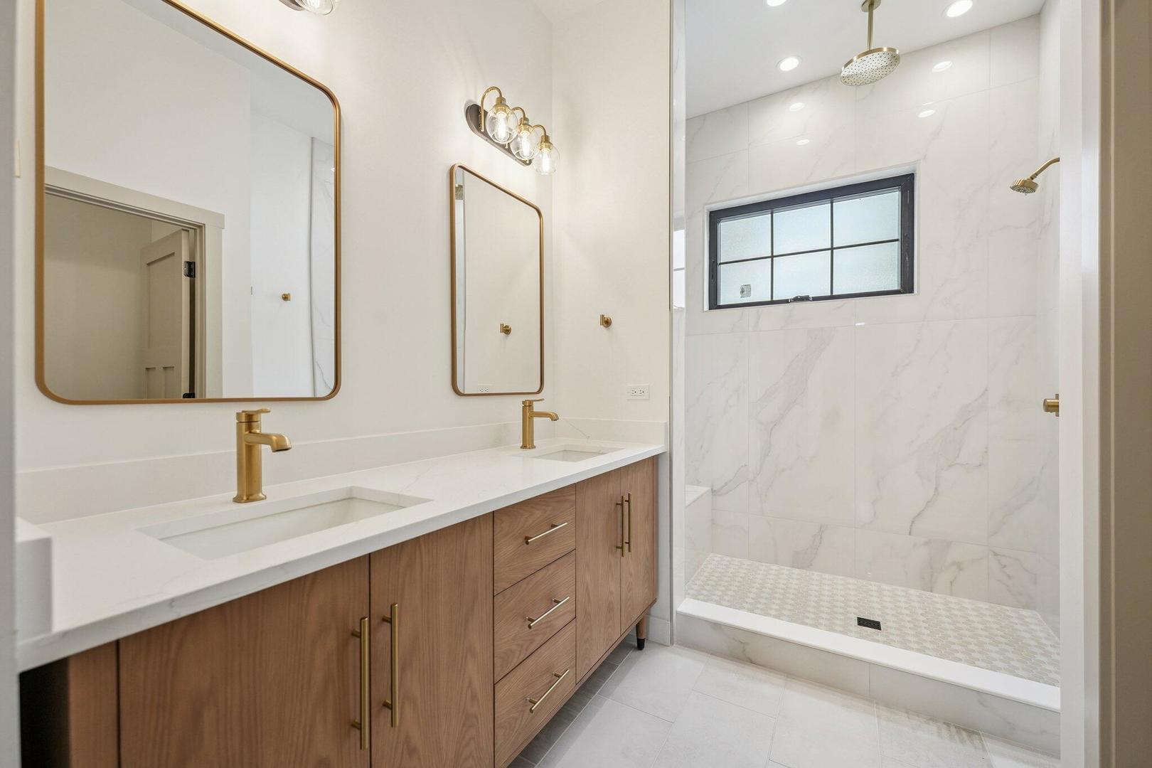 298 Apache Trail Lake In The Hills, IL 60156 - Photo 8 of 23 a bathroom with a double vanity sink mirror and shower