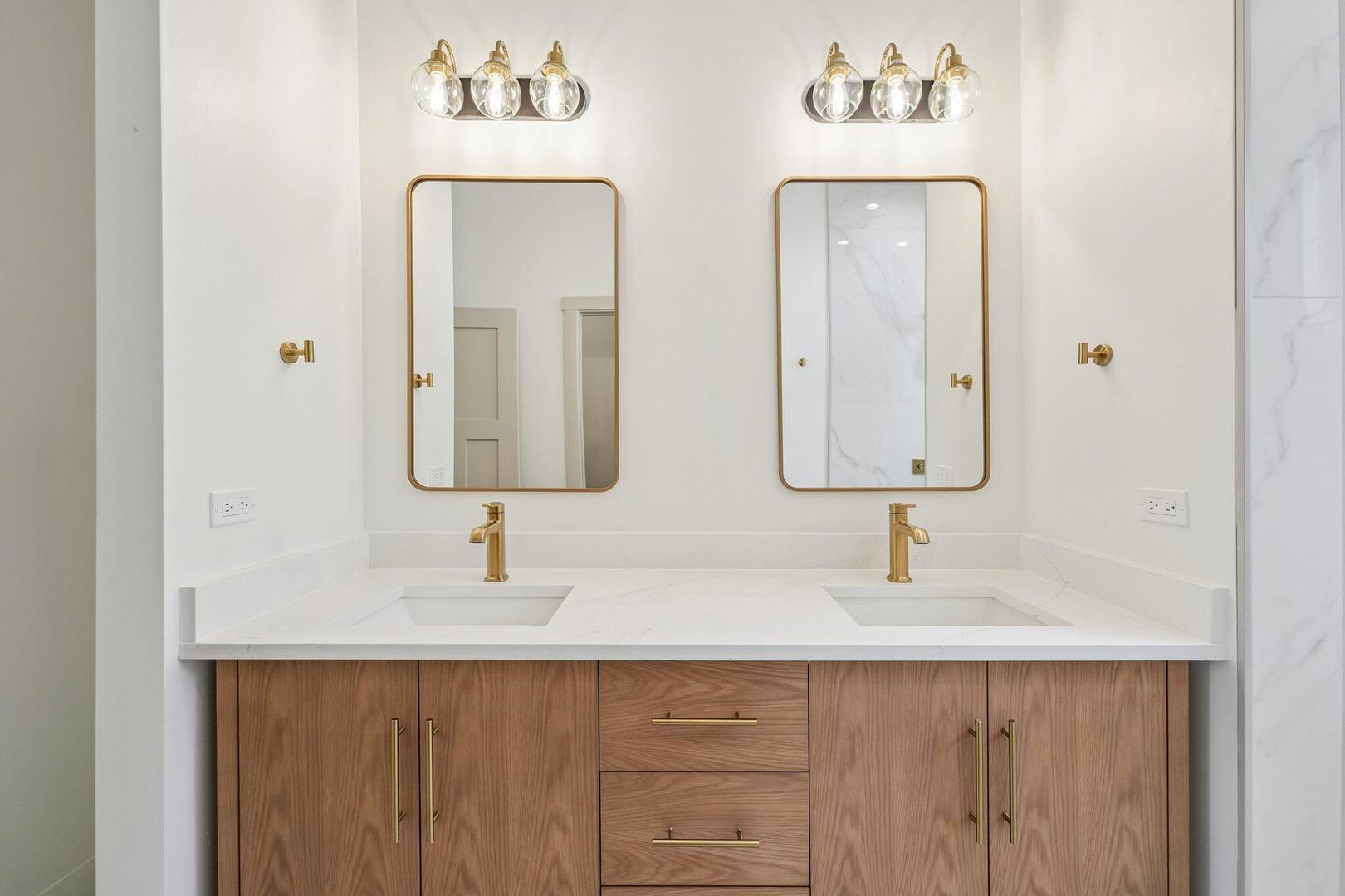 298 Apache Trail Lake In The Hills, IL 60156 - Photo 10 of 23 a bathroom with double vanity sinks and a mirror