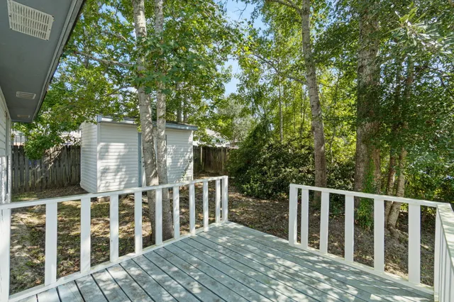 a view of a wooden fence