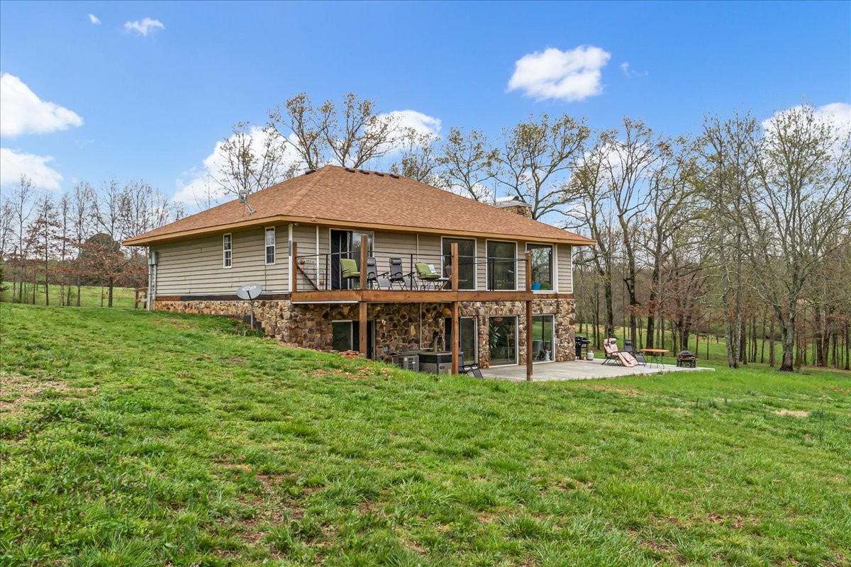 48 Mt Lebanon Road Lawrenceburg, TN 38464 - Photo 12 of 85 a view of a house with patio and a yard