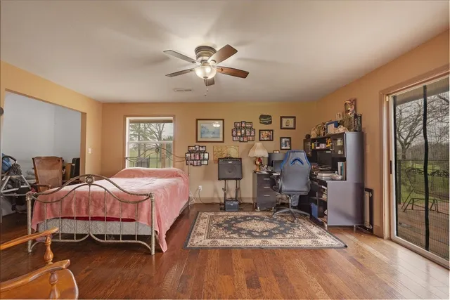 a view of a dining area with furniture window and wooden floor