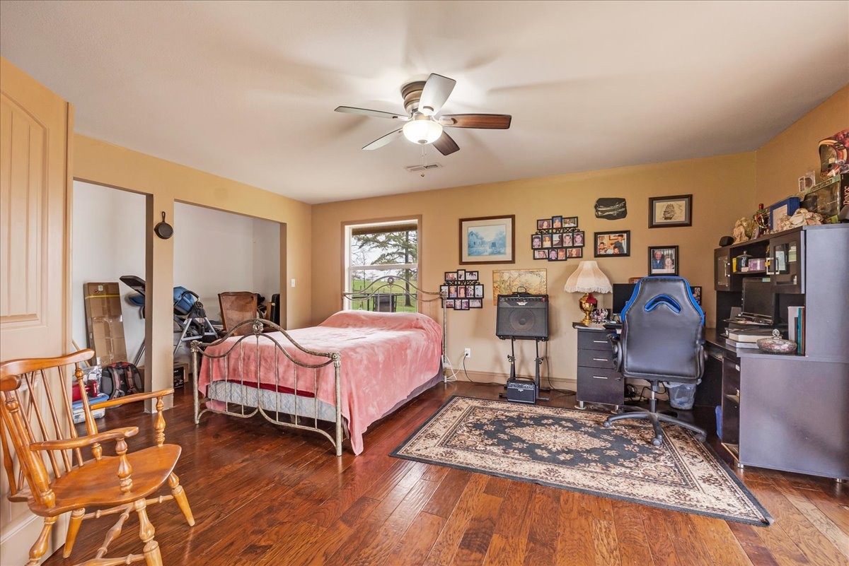 48 Mt Lebanon Road Lawrenceburg, TN 38464 - Photo 26 of 85 a bedroom with bed and a chandelier