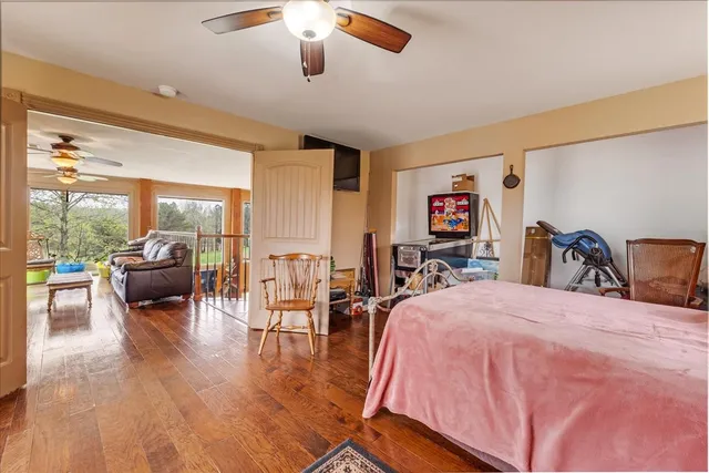 a kitchen with granite countertop a sink and cabinets