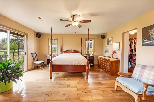 a bed room with a bed and a chandelier