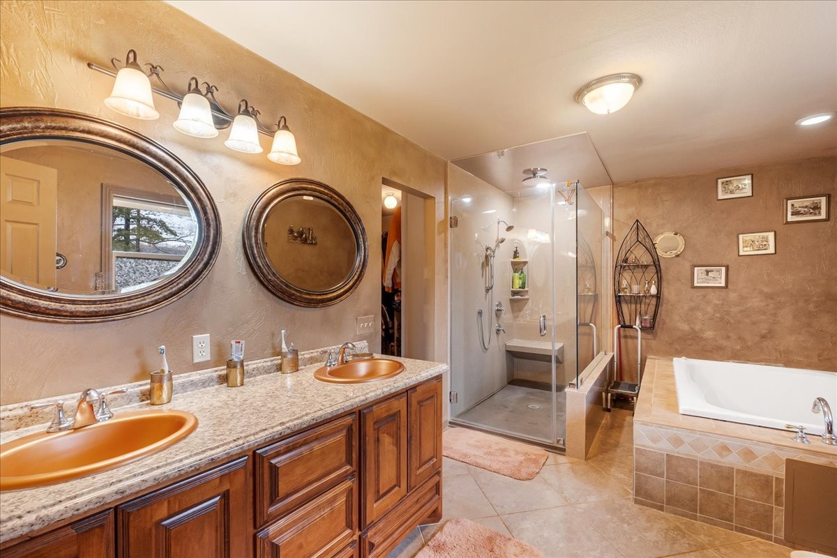 48 Mt Lebanon Road Lawrenceburg, TN 38464 - Photo 32 of 85 a bathroom with a granite countertop double vanity and a mirror