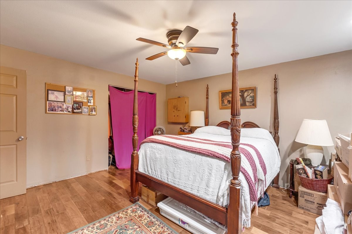 48 Mt Lebanon Road Lawrenceburg, TN 38464 - Photo 45 of 85 a bed room with a bed and a chandelier