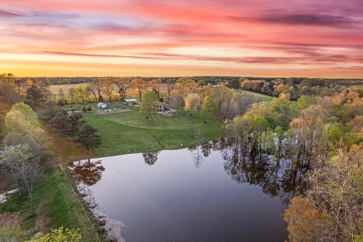 48 Mt Lebanon Road Lawrenceburg, TN 38464 - Photo 63 of 85 a view of a lake with a city
