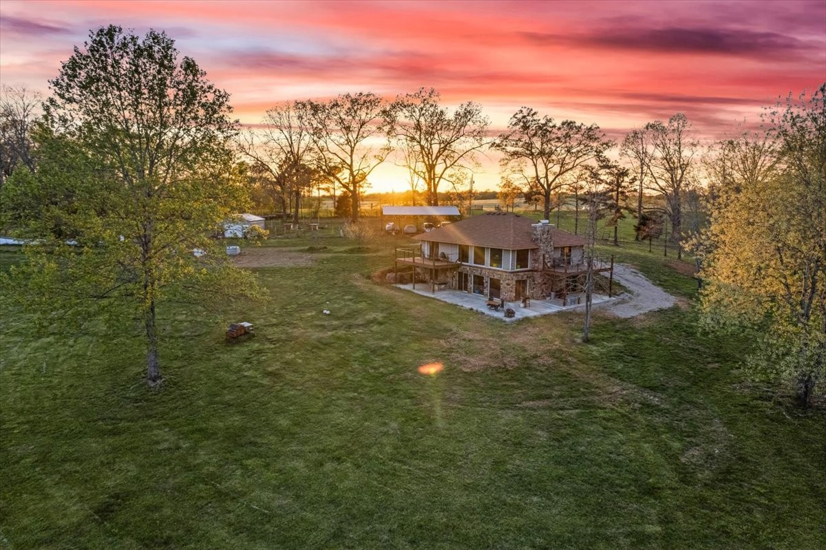 48 Mt Lebanon Road Lawrenceburg, TN 38464 - Photo 71 of 85 a view of a lake with a mountain in the background