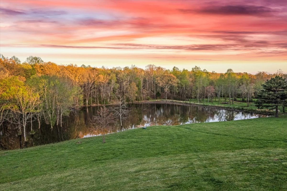 48 Mt Lebanon Road Lawrenceburg, TN 38464 - Photo 78 of 85 a view of a lake with a yard