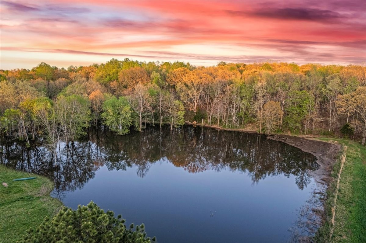 48 Mt Lebanon Road Lawrenceburg, TN 38464 - Photo 84 of 85 a view of a lake with a mountain in the background
