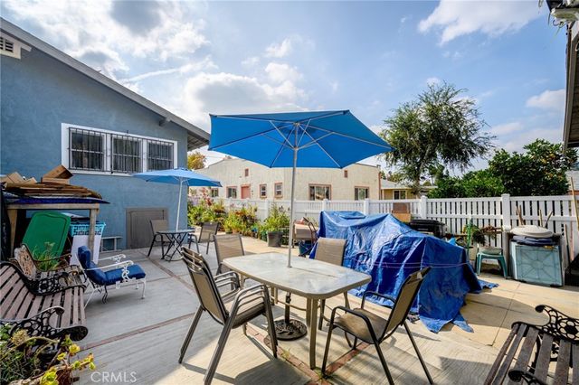 a view of yard with patio