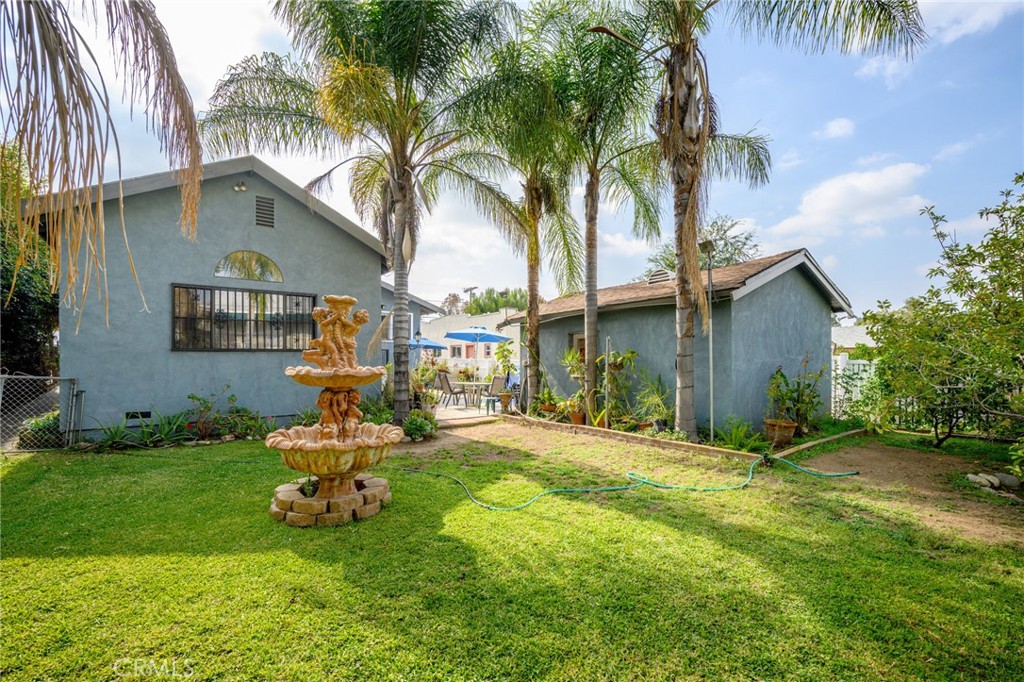 2161 Ridgeview Avenue Eagle Rock, CA 90041 - Photo 31 of 36 a view of a house with backyard and sitting area