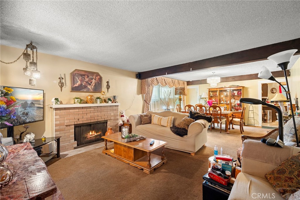 2161 Ridgeview Avenue Eagle Rock, CA 90041 - Photo 5 of 36 a living room with furniture and a fireplace