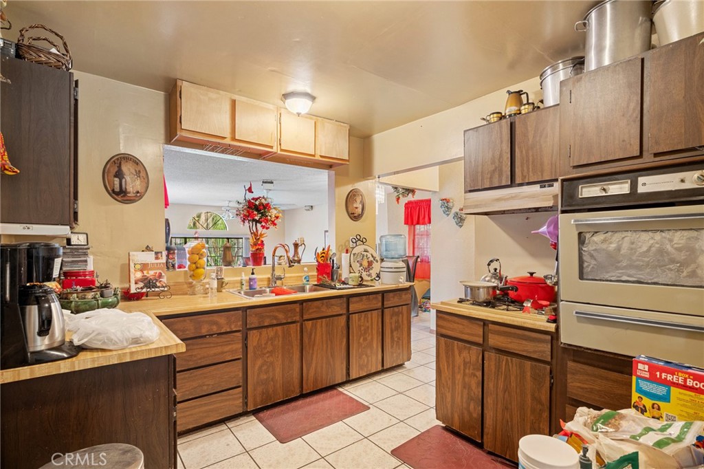 2161 Ridgeview Avenue Eagle Rock, CA 90041 - Photo 10 of 36 a kitchen with granite countertop a sink cabinets and appliances