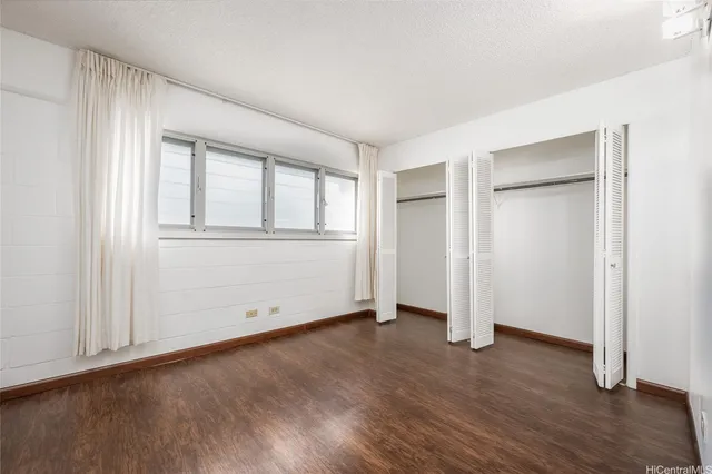 a view of a livingroom with wooden floor