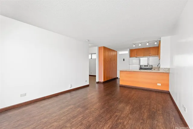 a view of kitchen with wooden floor and a sink
