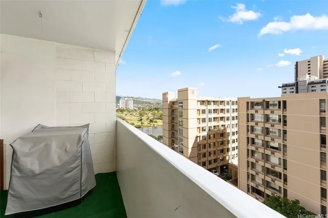 a view of balcony with furniture