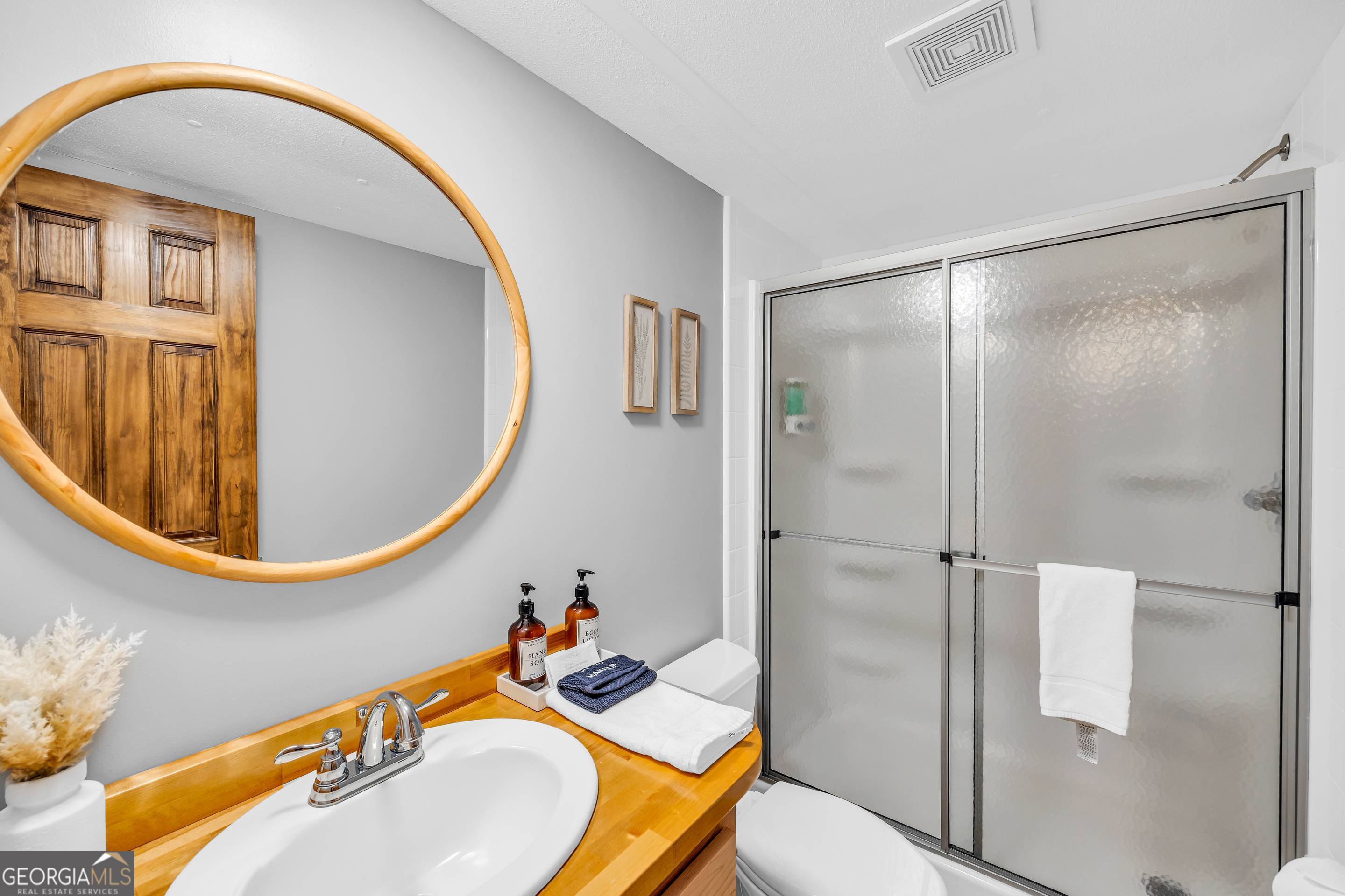 284 Duncan Bridge Road Sautee Nacoochee, GA 30571 - Photo 24 of 69 a bathroom with a sink and a mirror