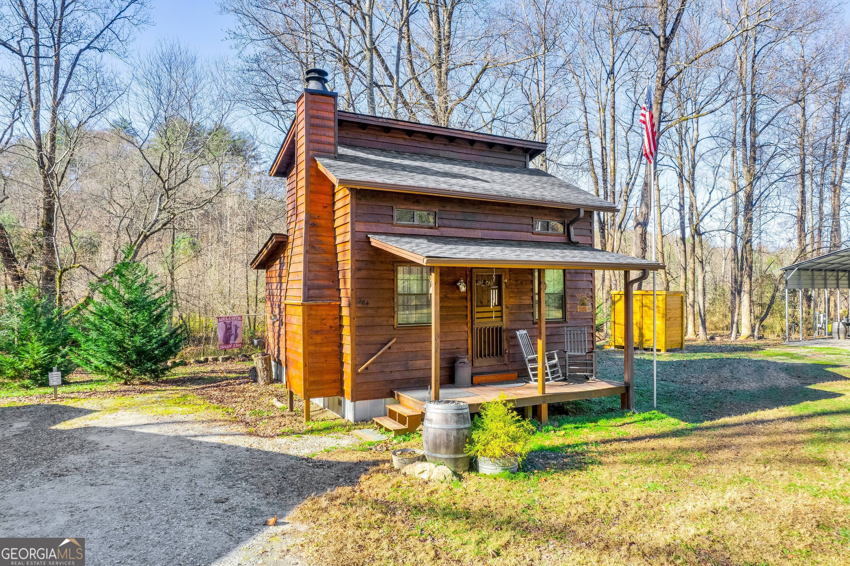 284 Duncan Bridge Road Sautee Nacoochee, GA 30571 - Photo 27 of 69 a view of a house with a patio