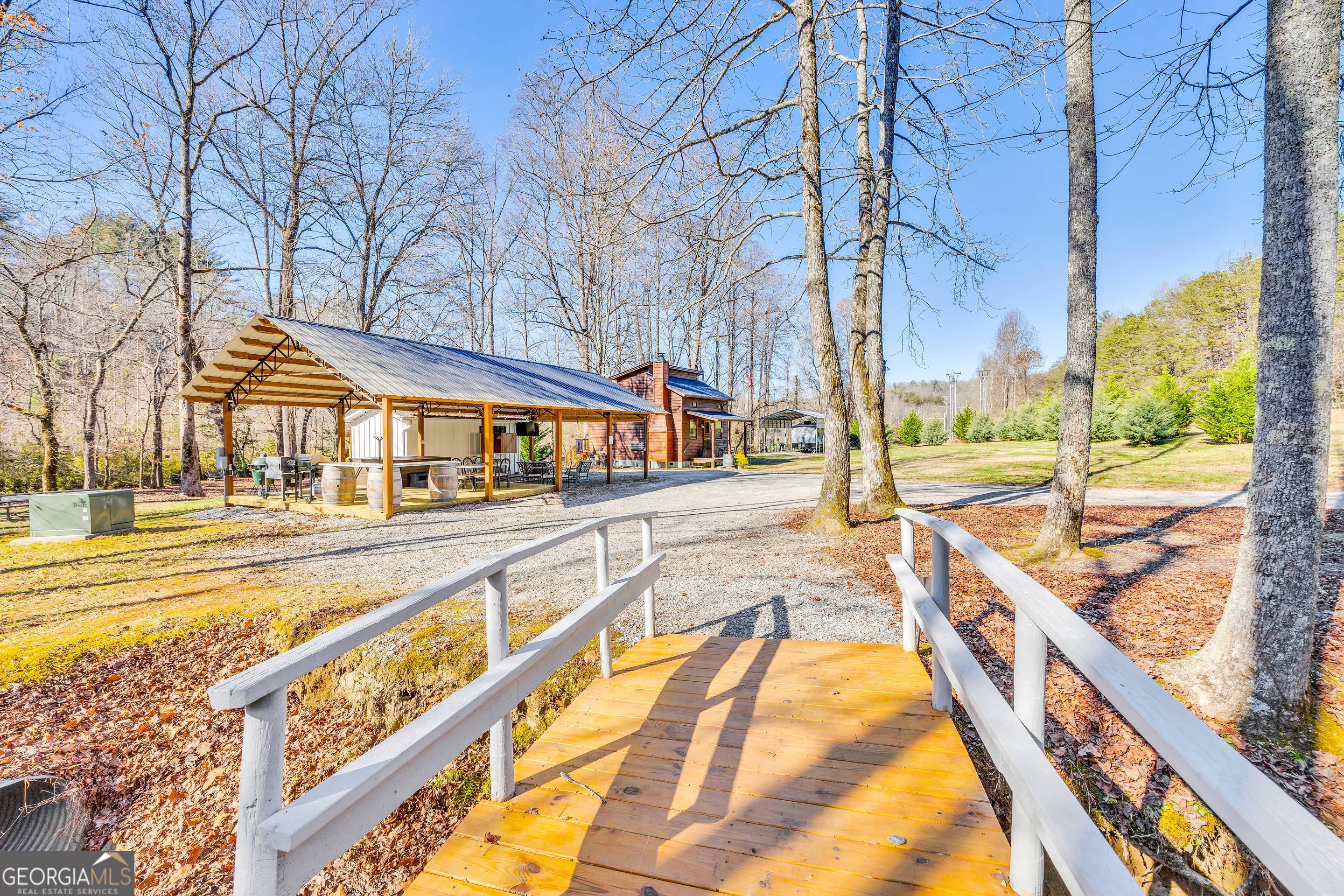284 Duncan Bridge Road Sautee Nacoochee, GA 30571 - Photo 39 of 69 a view of swimming pool with an outdoor seating