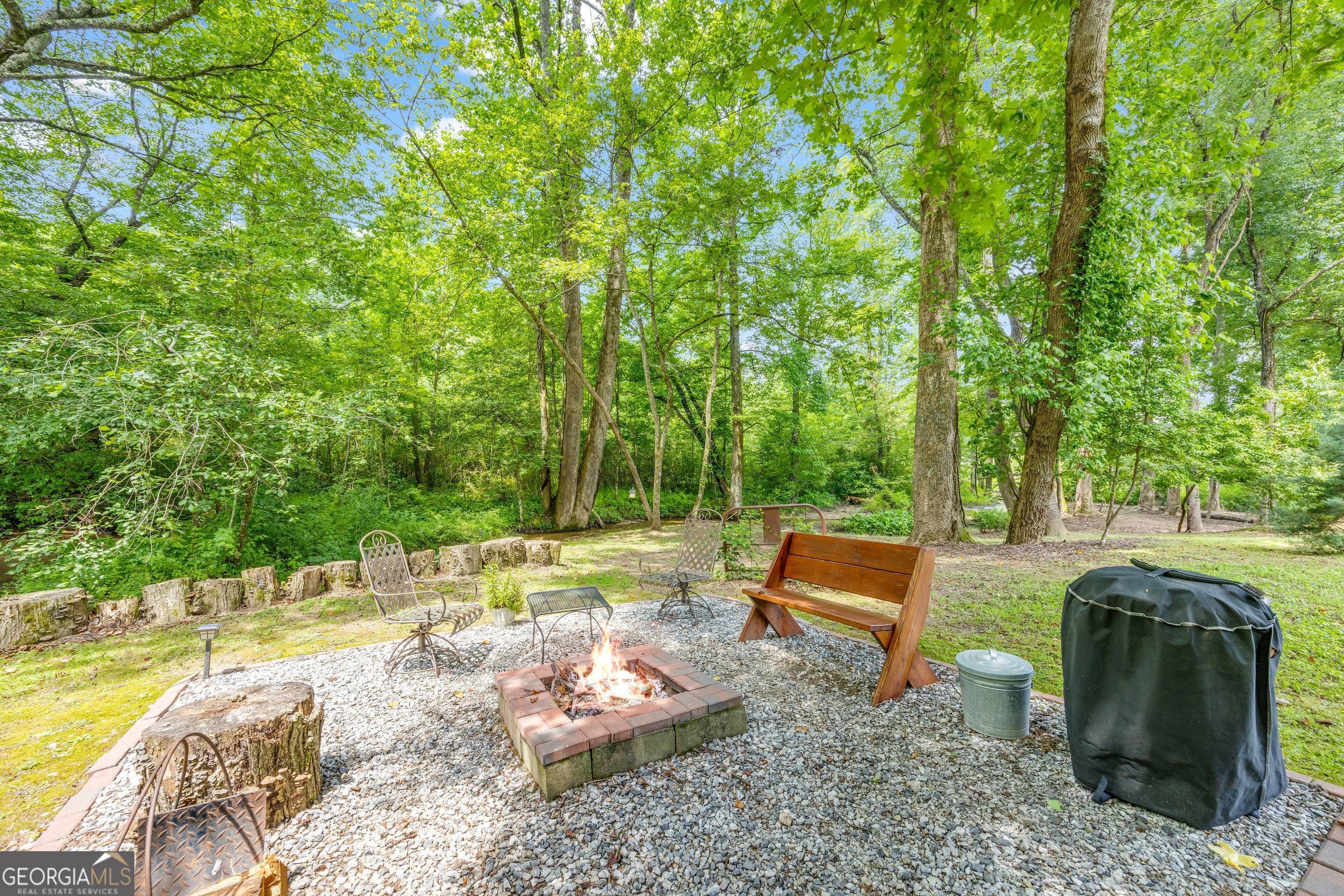 284 Duncan Bridge Road Sautee Nacoochee, GA 30571 - Photo 50 of 69 a garden view with a seating space