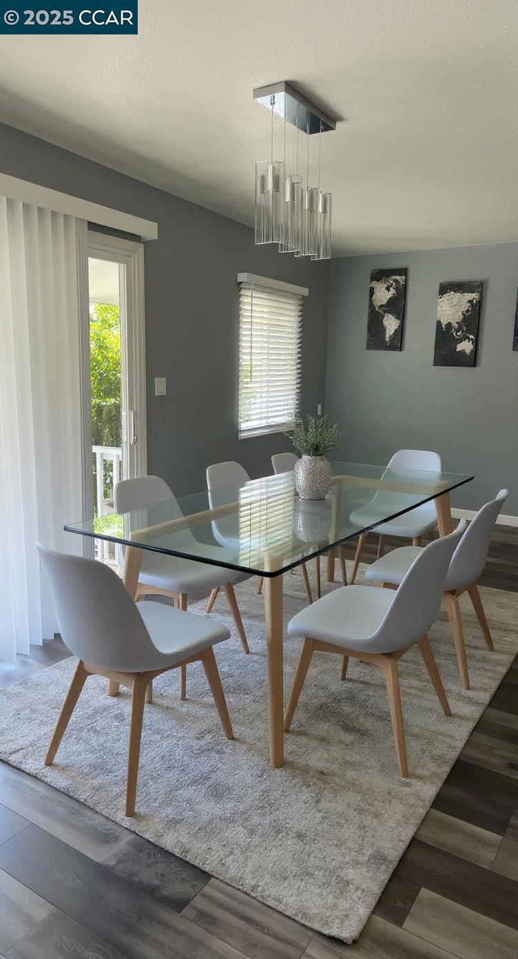 16711 Marsh Creek Road Clayton, CA 94517 - Photo 11 of 20 a view of a dining room with furniture and chandelier