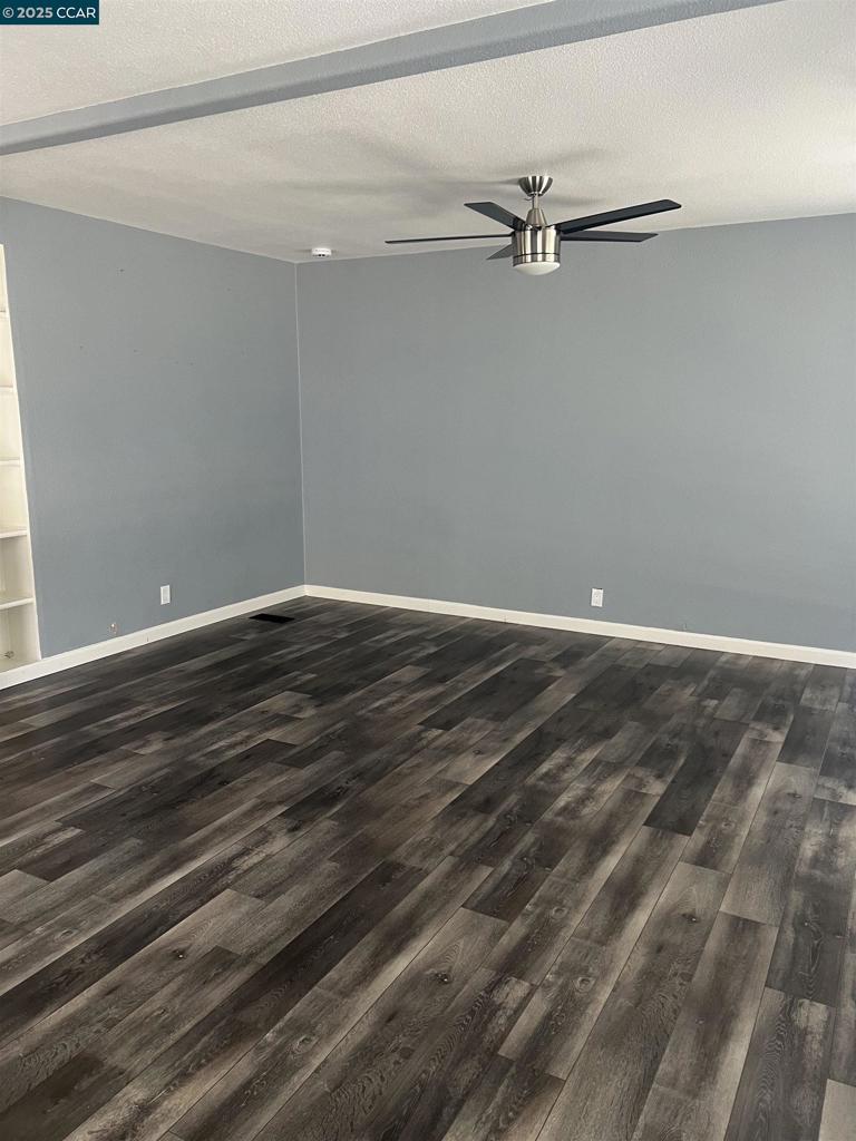 16711 Marsh Creek Road Clayton, CA 94517 - Photo 9 of 20 a view of a room with wooden floor