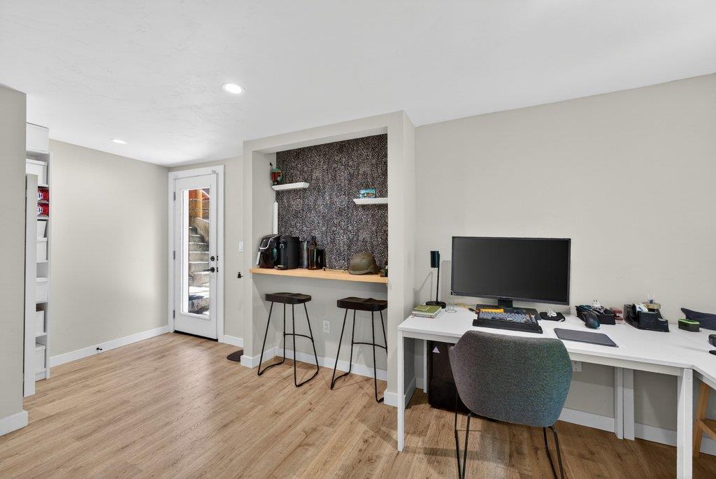 125 Shadowbrook Road Ben Lomond, CA 95005 - Photo 42 of 60 a view of a workspace with furniture and wooden floor