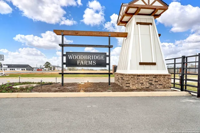 a sign on the side of a road