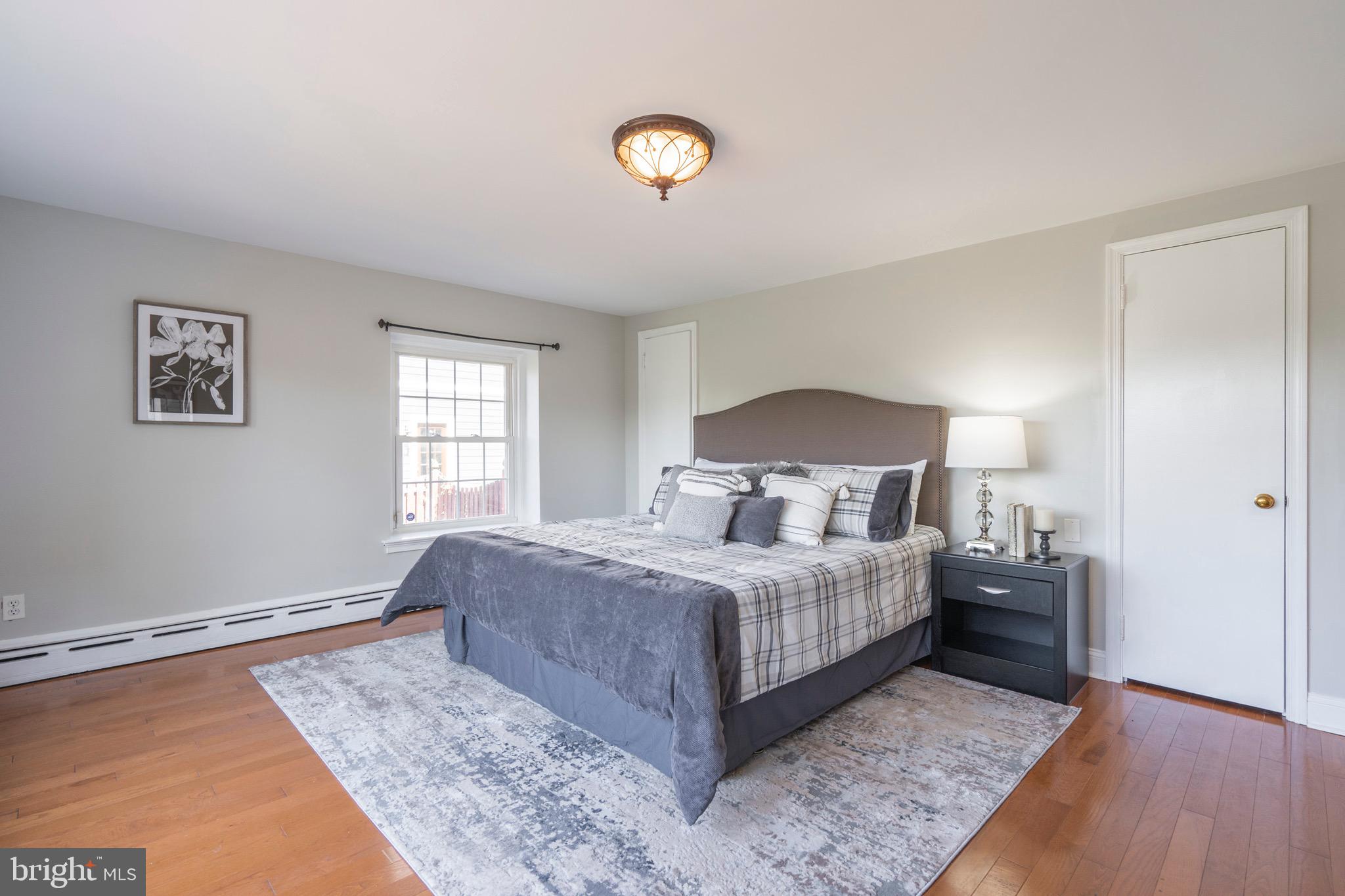 46 Golfview Road Ardmore, PA 19003 - Photo 22 of 47 a bedroom with a bed and a window