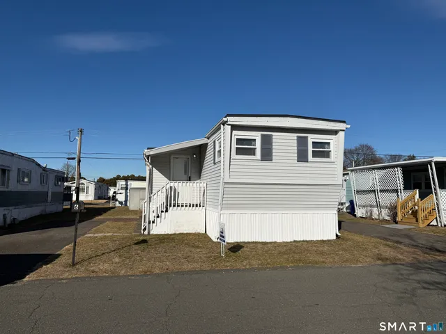 a house view with a street