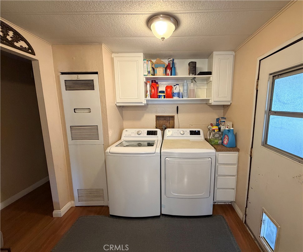1550 Rimpau Avenue, Unit 138 Corona, CA 92881 - Photo 12 of 29 a utility room with dryer and washer