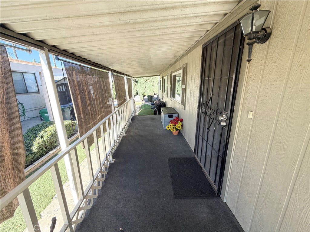 1550 Rimpau Avenue, Unit 138 Corona, CA 92881 - Photo 26 of 29 Front porch (covered)